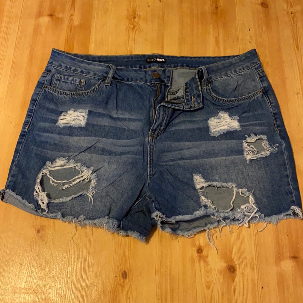 Distressed denim shorts